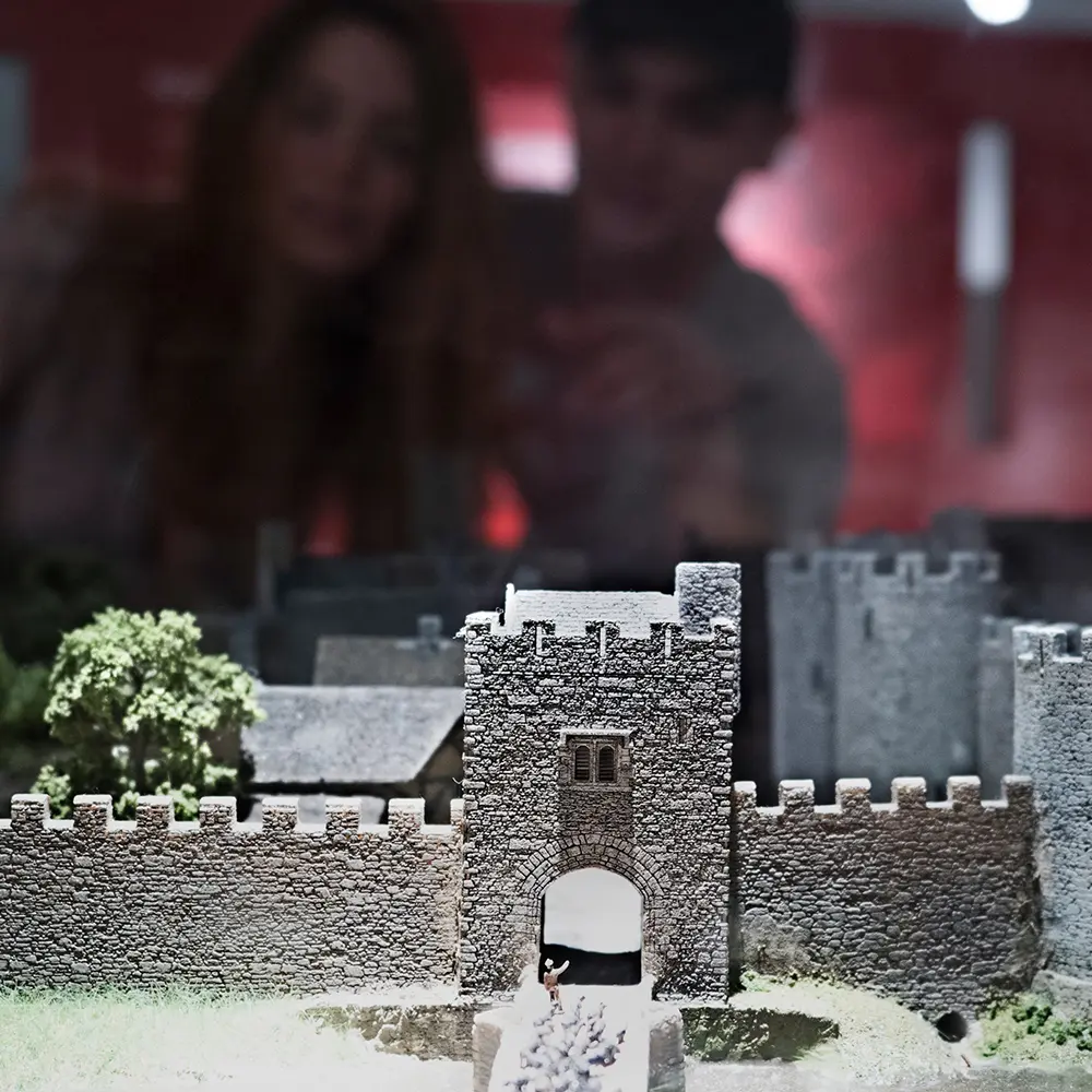family engaging with hands-on exhibits, 3D models at King John’s Castle