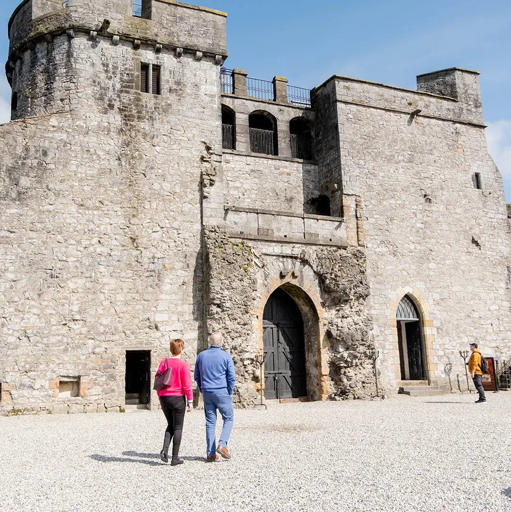 Visitors in the inner courtyard of King John's Castle