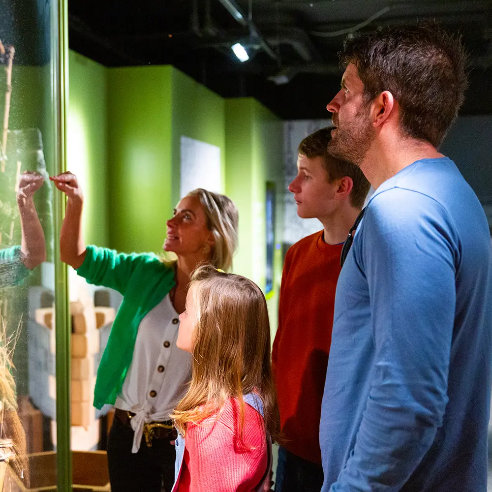 Family enjoying interactive exhibition at King John's Castle, Limerick.